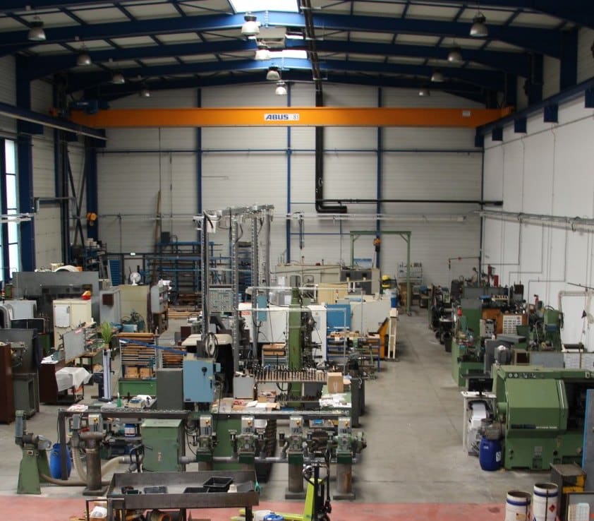 Machine shop with overhead crane on a Bid Industry industrial asset project in France